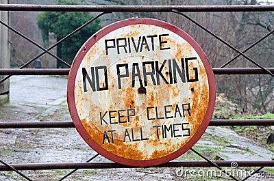 Rusty no parking sign