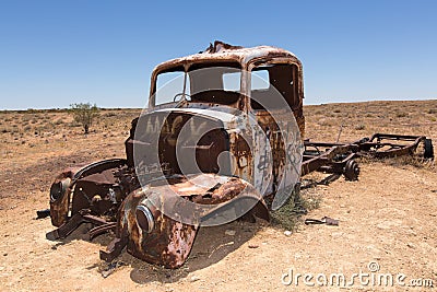 Rusty old truck in desert