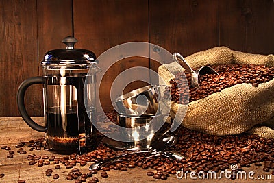 Sack of coffee beans with french press