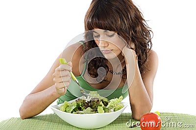 sad-teen-eating-salad-6333354.jpg