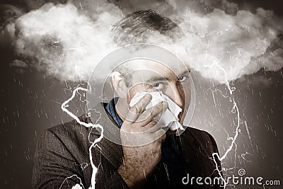 Sad and unhappy businessman crying a head storm