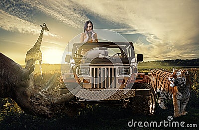 Safari:woman in the jeep discovering wild nature