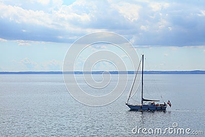 Sailboat yacht sailing in blue sea. Tourism