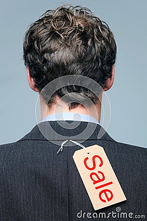 Sale label on the back of a mans jacket