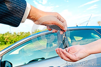 Sales Manager sends the keys to a new car