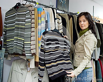 Saleslady in a jeans wear shop