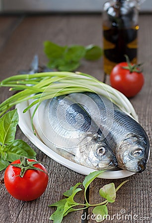 Salted herring with green onion and tomatoes