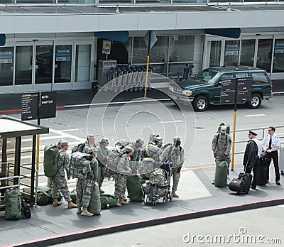 American soldiers returning home from duty in San Fransisco Airport
