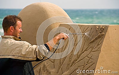 Sand sculptor work on beach