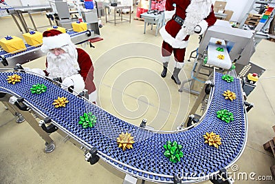 Santa claus at christmas ornament production line