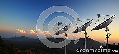 Satellite dish with sunset