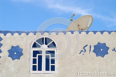 Satellite TV dish on muslim house