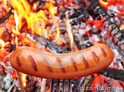 Sausage on a fork.