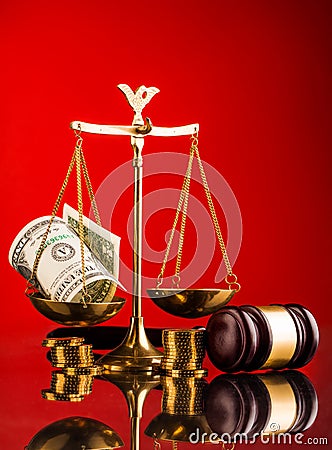 Scales of justice gavel and money