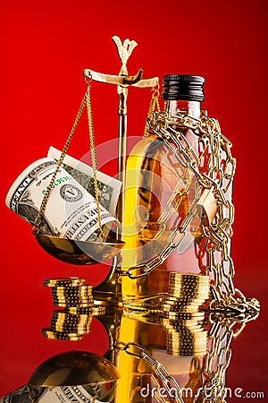 Scales of justice and whisky bottle