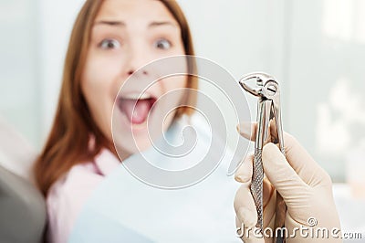 Scared woman at dentist s office