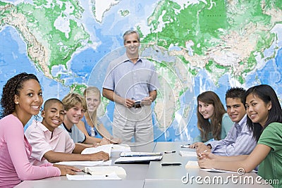 School children and their teacher in a class