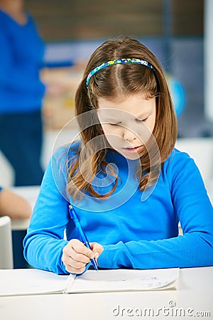 Schoolgirl writing notes