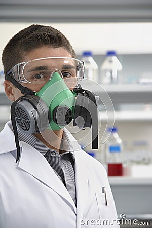 Scientist Wearing Gas Mask In Laboratory