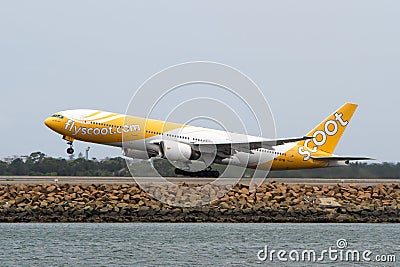 Scoot Airlines Boeing 777 jet taking off.