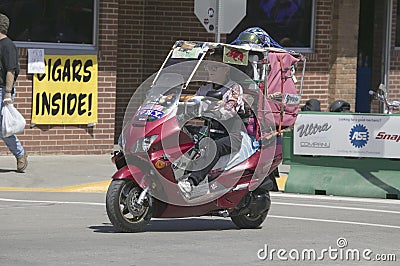 Scooter driving down Main Street