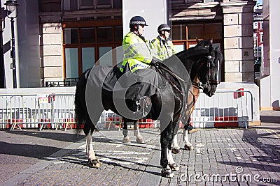 Scotland yard officers on horses