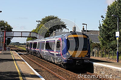 Scotrail dmu train passing Barry Links station