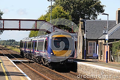 Scotrail dmu train passing Barry Links station