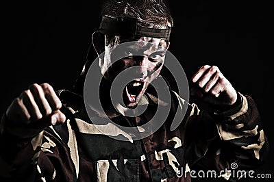 Screaming soldier wants to fight with enemy