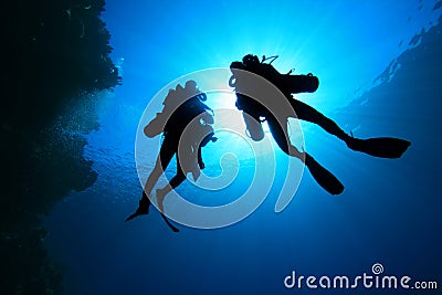 Scuba Divers silhouetted