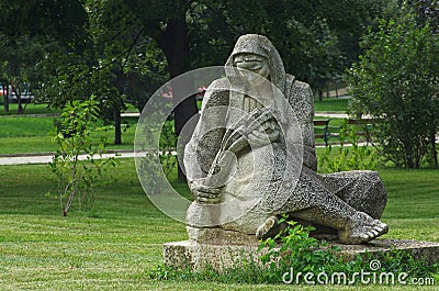 Sculpture of a woman with a sheaf of wheat