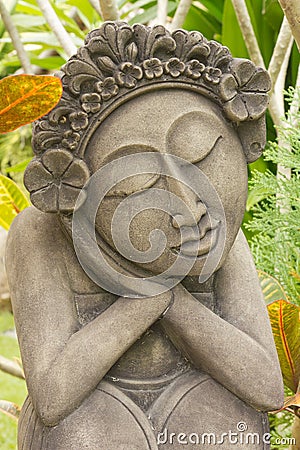 Sculpture of woman in Thai garden