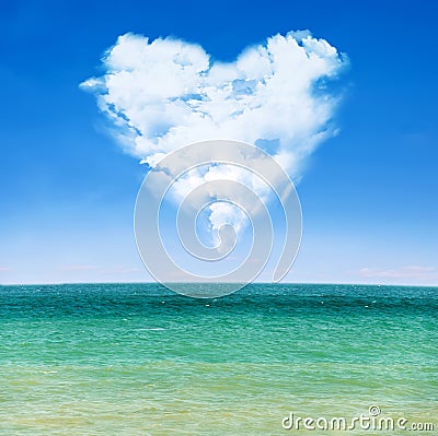Sea waves and blue sky with cloudy heart