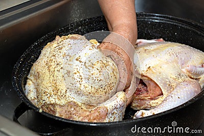 Seasoning raw whole chicken