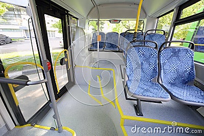 Seats in passenger compartment of empty city bus