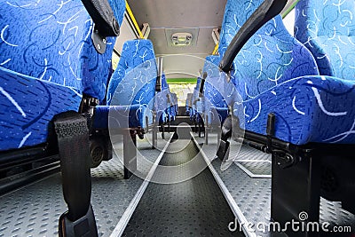 Seats in saloon of empty city bus