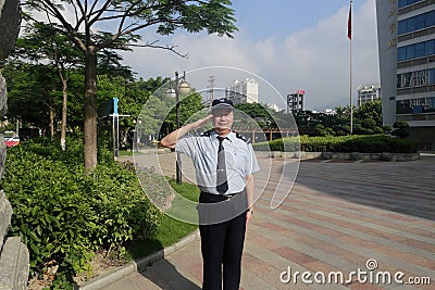 Security personnel salute
