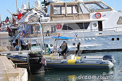 Security in rubber boat and yachts at film festival in Cannes, France