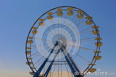 Ferris wheel on blue sky