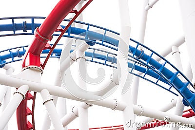 Segment of red and blue roller coaster rail