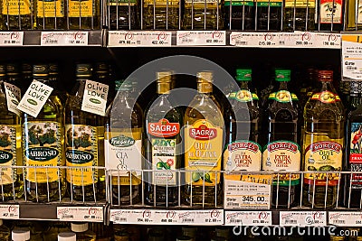 Selection of olive oil on the shelves in a supermarket Siam Paragon in Bangkok.