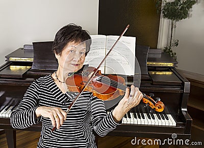 Senior Adult Women Playing the Violin