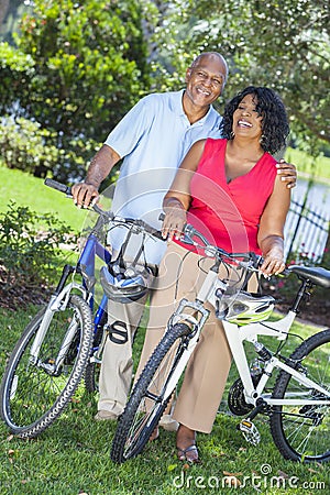 Senior African American Woman Man Couple on Bikes