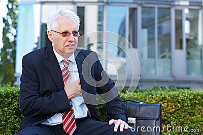 Senior business man with aching