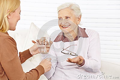 Senior citizen woman taking medical