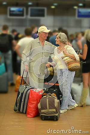 Senior couple at the airport