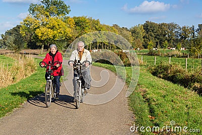 Senior couple on a bicycle