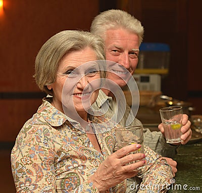 Senior couple drinking cocktail
