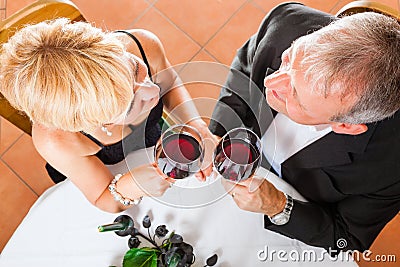 Senior couple eating dinner