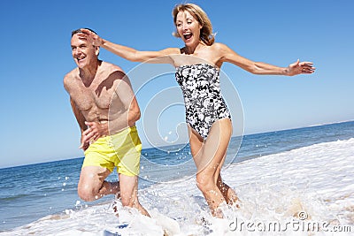 Senior Couple Enjoying Beach Holiday